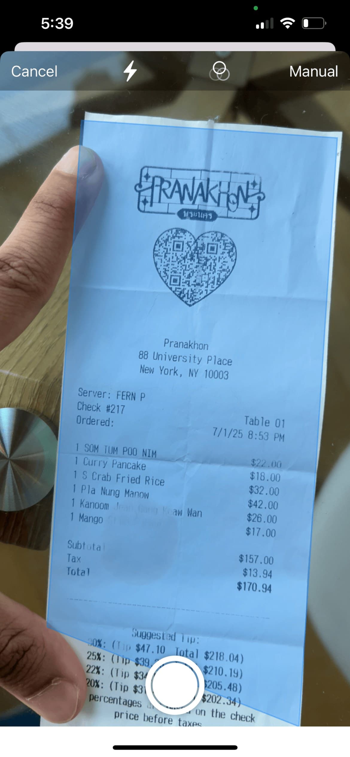 SplitNShare camera view capturing a paper receipt